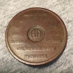 AA coin worn side.jpg