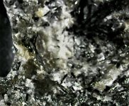 Sodalite grain in syenite, GMQ3, Saline Co., AR 15X, natural light.jpg