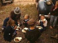 homesteader-and-his-children-eating-barbeque-at-the-pie-town-new-mexico-fair-1940.jpg