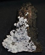 Hydrozincite on drusy quartz, Yong Chun, Fuijan Province, China, hand, natural light.jpg