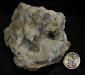 Calcite geode, Warsaw Fm (Miss.), Hamilton, Hancock Co., Illinois, US quarter for scale, natur...JPG