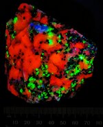 Calcite, Willemite, and sparse Hardystonite, Franklin, Sussex Co., NJ, MW 310nm.jpg