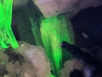 Elpidite, Mont St. Hilaire, Quebec, Canada, ~15X, SW 254nm, S Stuart.jpg