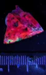 Sodalite, Mont St. Hilaire, Quebec, Canada, SW 254nm.jpg