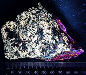 Dolomite, Calcite, Sphalerite, Sterling Hill Mine, Ogdensburg, Sussex Co., NJ, LW 365nm.jpg