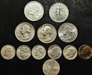 Not CRH 09 19 2024 Bank change counter rejects, $1.40 and Canadian 80%Ag quarter & French qtr ...jpg