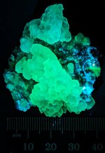 Quartz flower, Dugway Geode Beds, Dugway Mtn., Juab Co., Utah, MW 310nm.jpg
