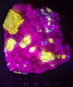 Scapolite, var. marialite, in calcite matrix, Afghanistan, MW 310nm.jpg