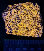 Wollastonite, Sterling Hill Mine, Ogdensburg, Sussex Co., NJ, SW 254nm.jpg