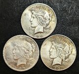 Three fake Chinese US silver liberty dollars.jpg