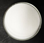 Morton Salt Substitute (KCl), 88.6 grams in petri dish, natural light.jpg